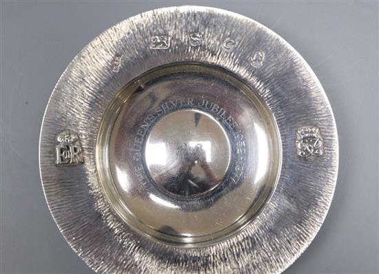 A 1970s silver commemorative dish, a Georgian silver caddy spoon, Dutch caddy spoons and other items.